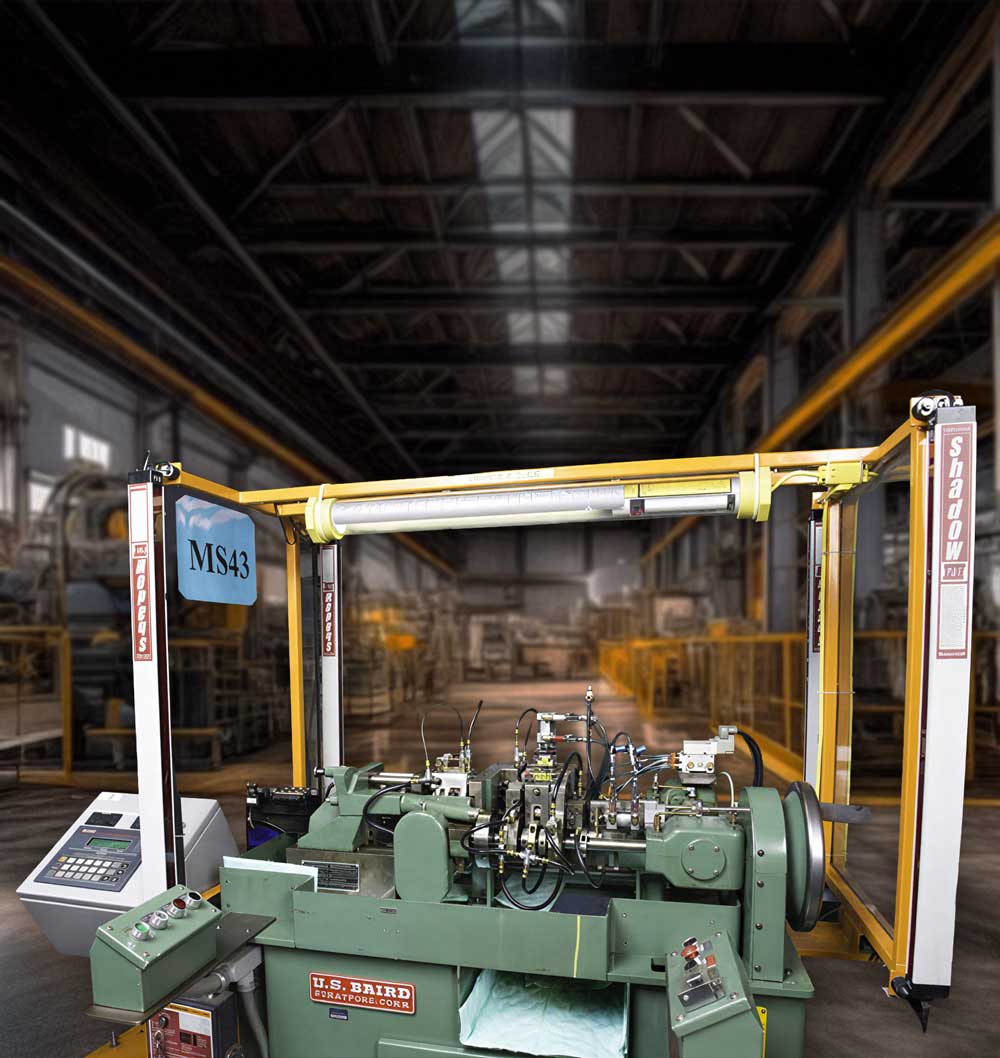 U.S. Baird slide forming production machine used in manufacturing.