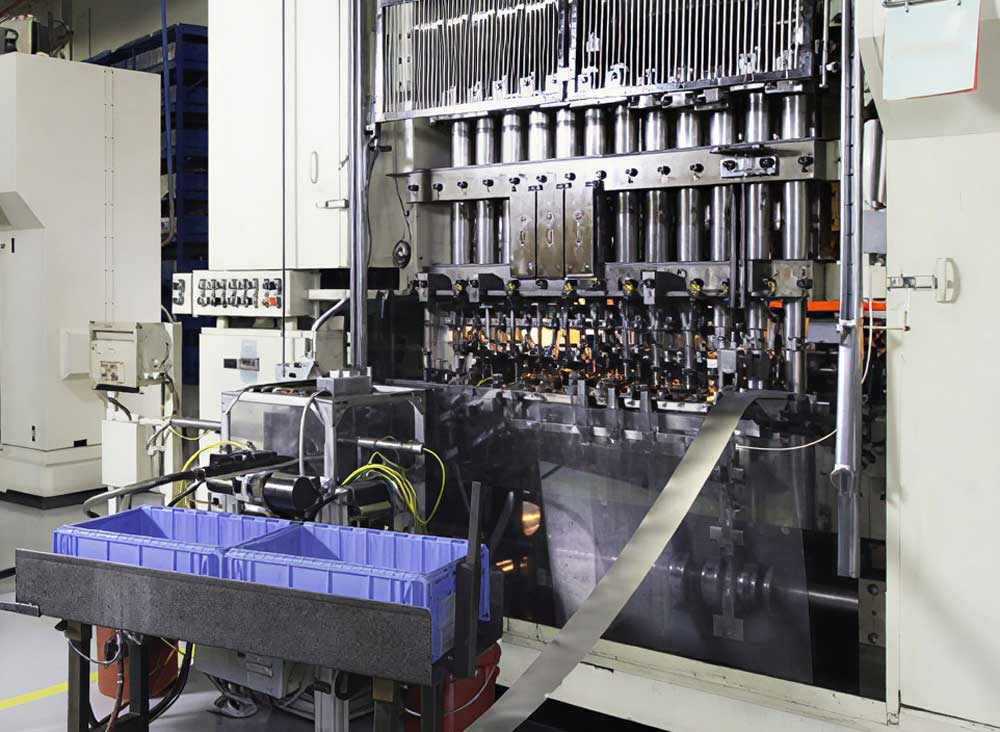 View of an original eyelet machine from Stewart EFI.