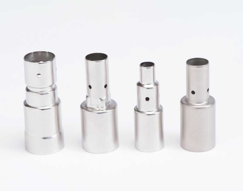 Four precision deep-drawn metal housings with side holes displayed on a white background.