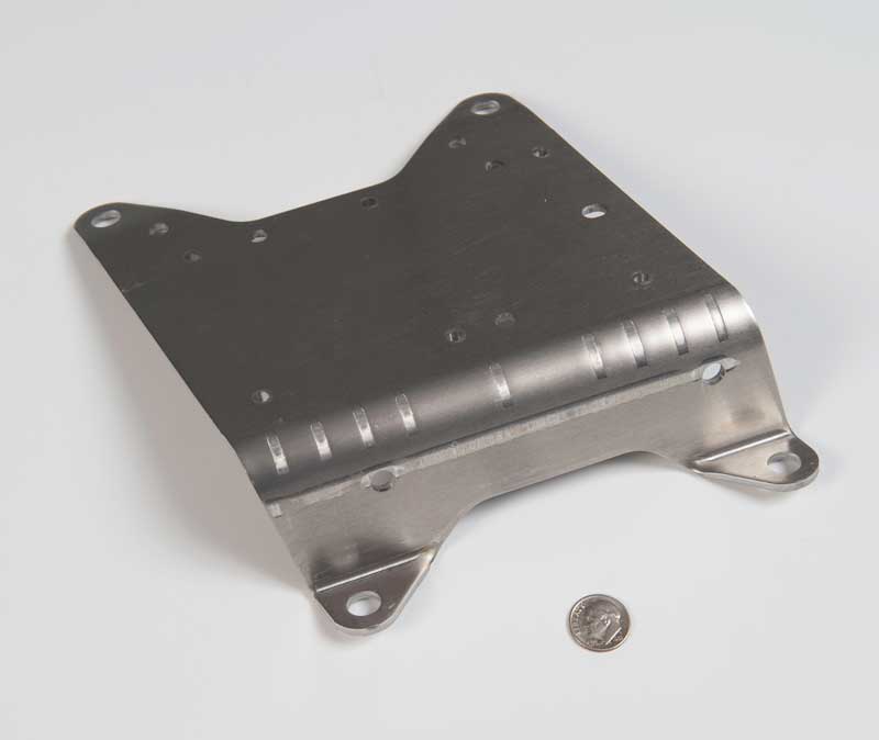 Formed stainless steel mounting bracket with multiple holes and flanges, shown with a coin for scale.